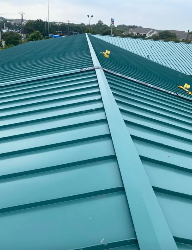 Green commercial metal roof ridge and valley for Metal Roof Repair in Potomac